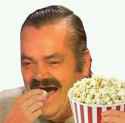 laughing mexican guy meme eating popcorn 