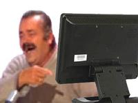 mexican laughing guy pointing at computer screen 