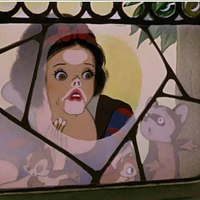 snow white face against glass 