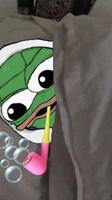 pepe blowing bubbles in bed 