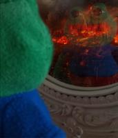 pepe plush watches city burn 