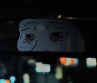 wojak doomer in rear mirror 